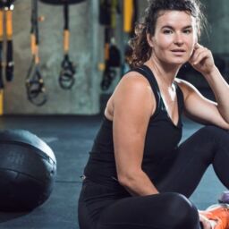 woman in gym with weights